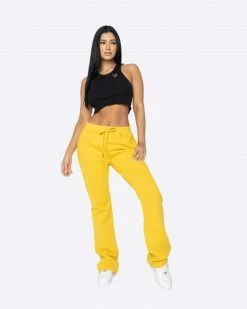 EPTM. EPTM WOMEN FRENCH TERRY FLARE PANTS-MUSTARD BOTTOMS