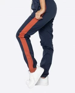 EPTM. BOTTOMS EPTM WOMEN NYLON BASIC TRACK PANTS-NAVY/RUST