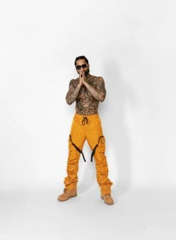 EPTM. CARGOS DAVE EAST STRAP STACKED FLARE PANTS - MUSTARD